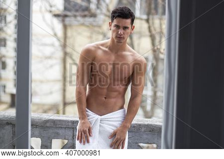 Shirtless, Athlete Handsome Man Poses On Balcony With Naked Torso In Outside.
