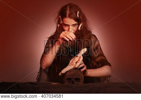 Woodoo Witch Spelling Fetish Doll Practicing Magic Ritual