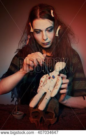 Woodoo Witch Spelling Fetish Doll Practicing Magic Ritual
