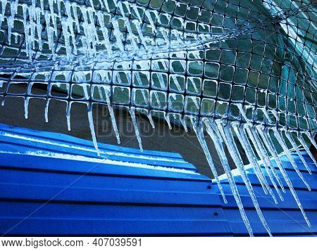 Spring Ice On The Construction Grid, Transparent Icicles