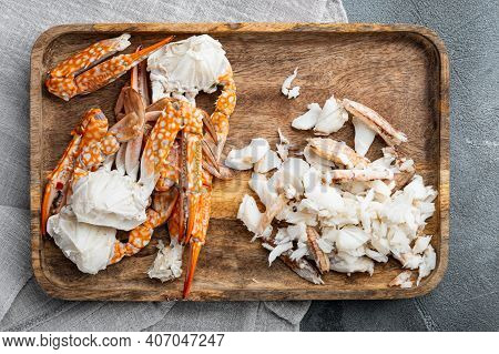 Boiled Blue Swimming Crab Claws Set, On Gray Background, Top View Flat Lay