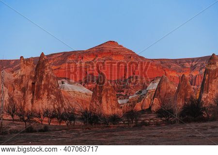 Red Valley At Cappadocia, Turkey. Volcanic Mountains In Goreme National Park.