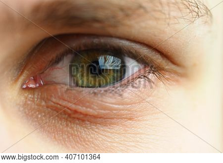 A Mans Eye. Macrophotography Of The Human Eye, Pupil And Eyelashes. High Quality Photo
