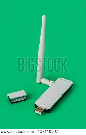 Wi-fi dongle receiver on green background