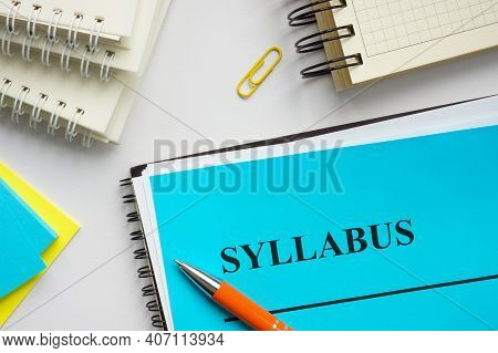 Syllabus Educational Plan And Papers On The Desk.