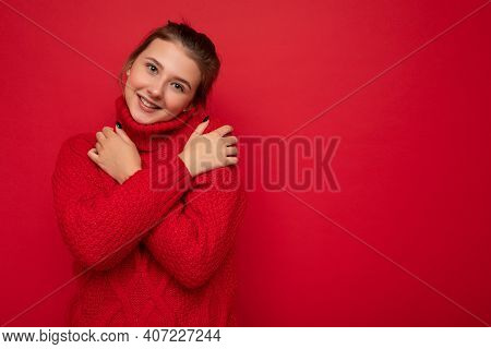 Attractive Cute Smiling Young Woman Wearing Warm Red Sweater Isolated Over Red Background Wall Keepi