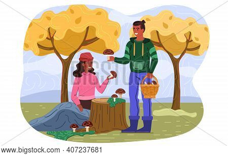 Young Couple Is Picking Mushrooms In The Forest. Outdoor Activity. Male And Female Mushroomers Pick 