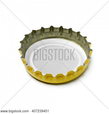 Single crown cork bottle cap close up isolated on white background 