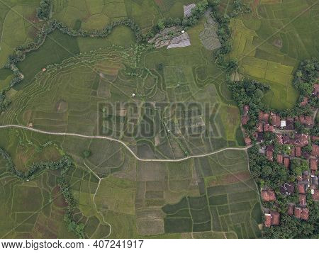 Aerial View Of Rice Fields On Terraced Of Cariu With Noise Cloud After Rain, Bogor, Indonesia. Indon