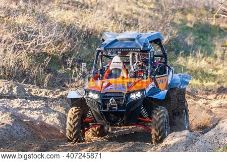 Afipsip, Russia - October 31, 2020: Sportsman Drives Buggy At Mud Racing Contest. Atv Ssv Motobike C