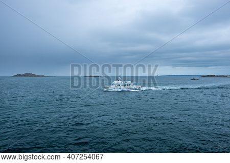 Roscoff, France - August 28, 2019: Ferry From Shipping Company Enez Vaz Carries Passengers From The 