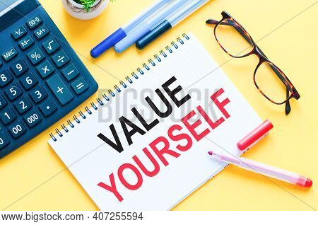 Writing Text Showing Value Yourself. Word Text Value Yourself On White Paper Card, Red And Black Let