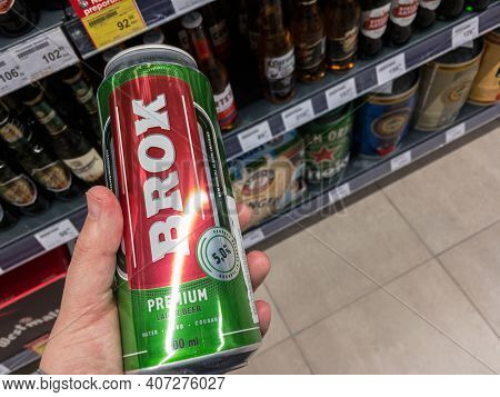 Belgrade, Serbia - January 28 2021: Hands Holding A Can Of Brok Beer. Brok Is A Light Beer, Is An In