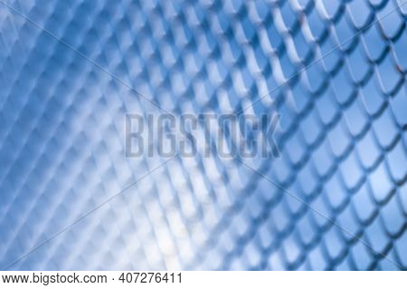 Out Of Focus Metal Mesh Abstrack Background In Blue Tone