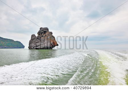 Foggy morning after a storm. The island-rock 