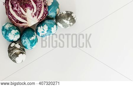 Natural Easter Egg Dye. Easter Dyed Eggs In Blue Color. Staining Of Easter Eggs With Red Cabbage. Na