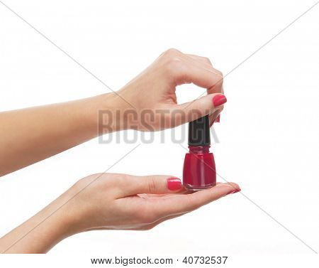 Belle mani femminile con la manicure polich isolata on white