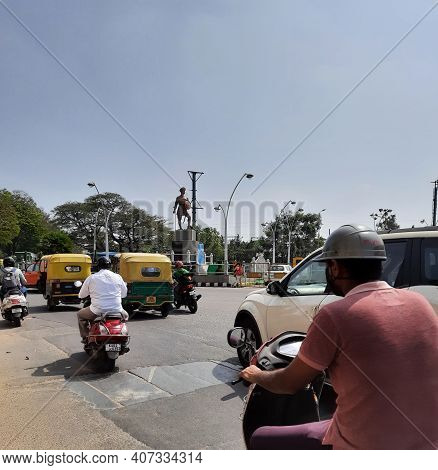 Closeup Of Heavy Traffic In A Sangolli Rayanna Statue Circle And Beautiful View Of Flyover Or Bridge