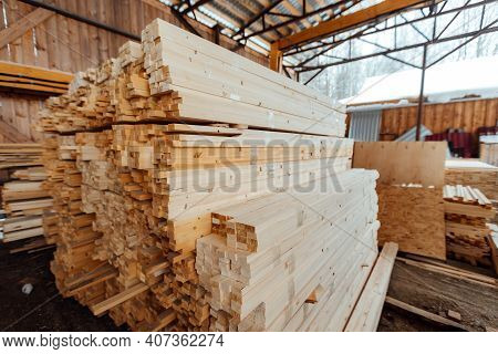 Warehouse Of Wooden Boards, Background Texture Of Wood Harvested For Shipment To The Factory, Finish