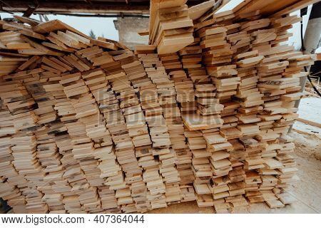 Warehouse Of Wooden Boards, Background Texture Of Wood Harvested For Shipment To The Factory, Finish