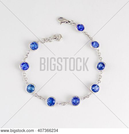 Fashion Blue Sapphire Bracelet On White Background. Jewelry Theme.