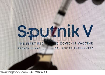 Oxford, Uk - February 2020: Sputnik V Covid Vaccine Logo With Syringe And Vial