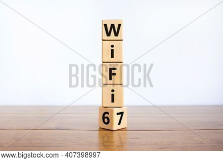 Wifi 6 Or 7 Symbol. Turned A Wooden Cube And Changed The Words Wifi 6 To Wifi 7. Beautiful Wooden Ta