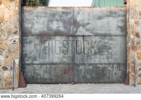 Old Rusty Door Of An Old Factory