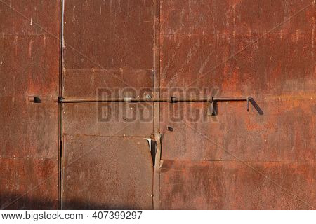 Old Rusty Door Of An Old Factory
