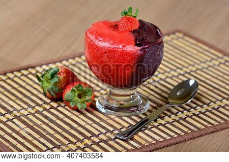 Acai And Strawberry Cream Bowl, Delicious Açai Dessert On A Wooden Table