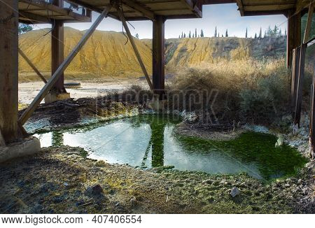 Green Acidic Pool Of Toxic Waste Near Abandoned Kokkinogia Copper Mine In Mitsero, Cyprus