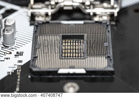 Macro Shot Of Empty Modern Lga 1200 Socket For Cpu On Black Desktop Motherboard.