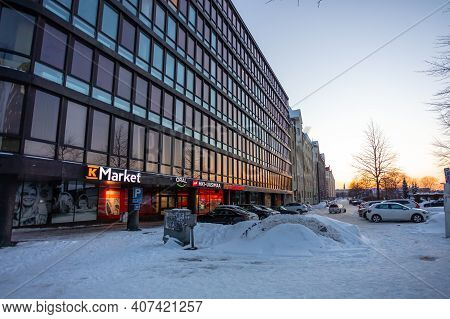 Helsinki, Finland January 4, 2021 Hakaniemi District Modern Office View At Sunset. Winter Evening. H