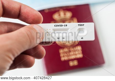 Person Holding Covid-19 Serological Rapid Diagnostic Test,at Home Or Point Of Care Testing Procedure