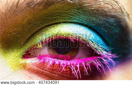 Eye With Colorful Neon Paint Fashion Makeup. Holi, Paint Party, Colors Festiva