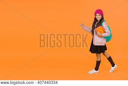 School Is Back. Happy Small Child Back To School. Little Girl Go To School Orange Background. Back T