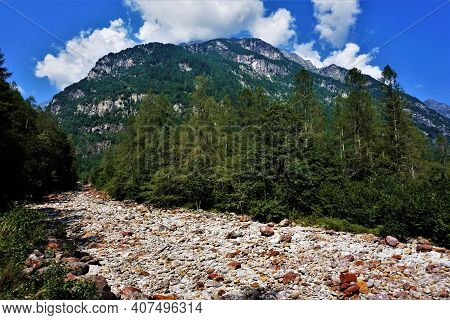 Pebble Of The Verzasca River And Beautiful Swiss Landscape