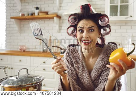 Funny Inexperienced Housewife Feeling Stressed And Helpless While Cooking A Meal
