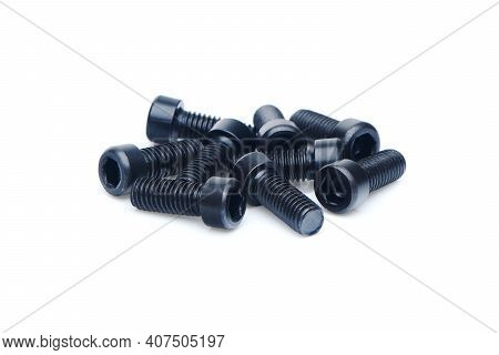 Group Of Black Hex Screws With Hex Cap Head Close Up Isolated On White Background