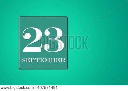 September 23 Is The Twenty-third Day Of The Month. Calendar Date In Turquoise Frame On Green Backgro