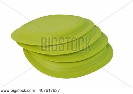 Klang,malaysia:february 11,2021:green Plates Over White Background. Tupperware Brand.