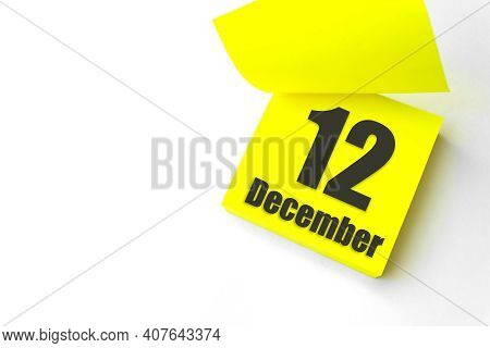 December 12nd. Day 12 Of Month, Calendar Date. Close-up Blank Yellow Paper Reminder Sticky Note On W