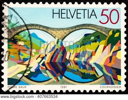 Moscow, Russia - February 11, 2021: Stamp Printed In Switzerland Shows Bridge Of Natural Stone Near 