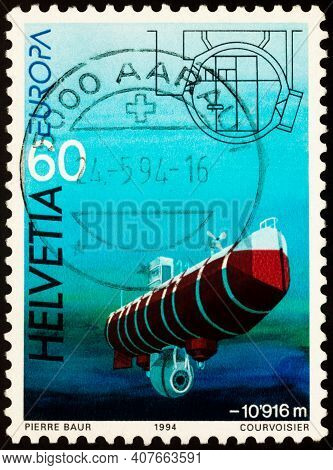 Moscow, Russia - February 11, 2021: Stamp Printed In Switzerland Shows Research Bathyscaphe Trieste 