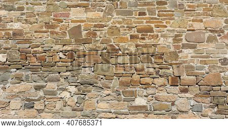 Castle Wall Made Of Old Stones Textures For Design And Photo Background.