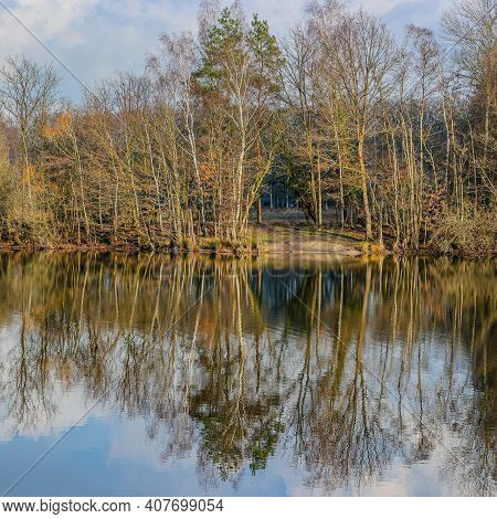 Dal Van De Roodebeek, Dutch Nature Reserve With A Lake With Mirror Reflection On The Water Surface O