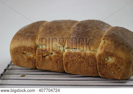 Home Baked Mini Roll Loaf Bread With Visible Bands Of Rolls