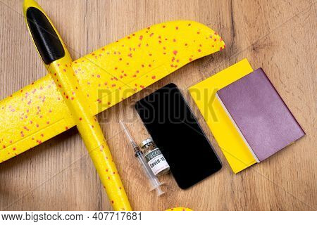 Travel And Coronavirus Vaccine. International Certificate Of Vaccination With Passport Near Mockup P