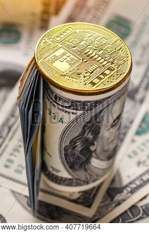 Golden Bitcoin Lies On The Banknotes.new Virtual Money. Crypto Currency Top View. Real Coins Of Bitc