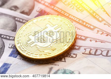 Golden Bitcoin Lies On The Banknotes.new Virtual Money. Crypto Currency Top View. Real Coins Of Bitc